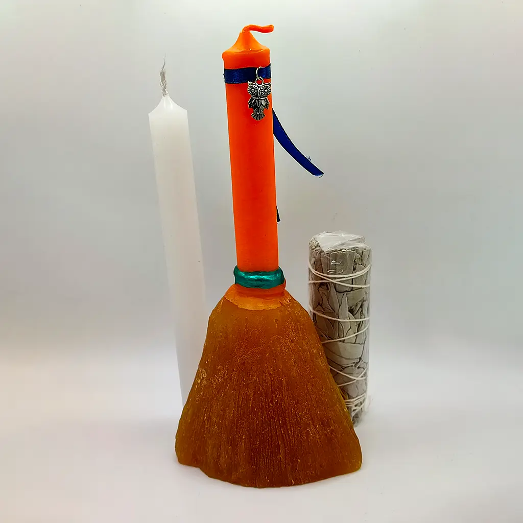 ritual escoba de limpieza total con vela blanca y atado de salvia