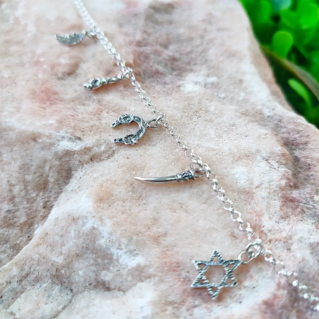 Pulsera de plata con estrella de David herradura mano fico cuerno y luna