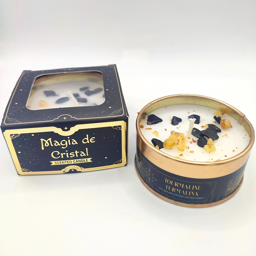 Vela Magia de Cristal Turmalina con minerales naturales decorando la cera junto a su caja