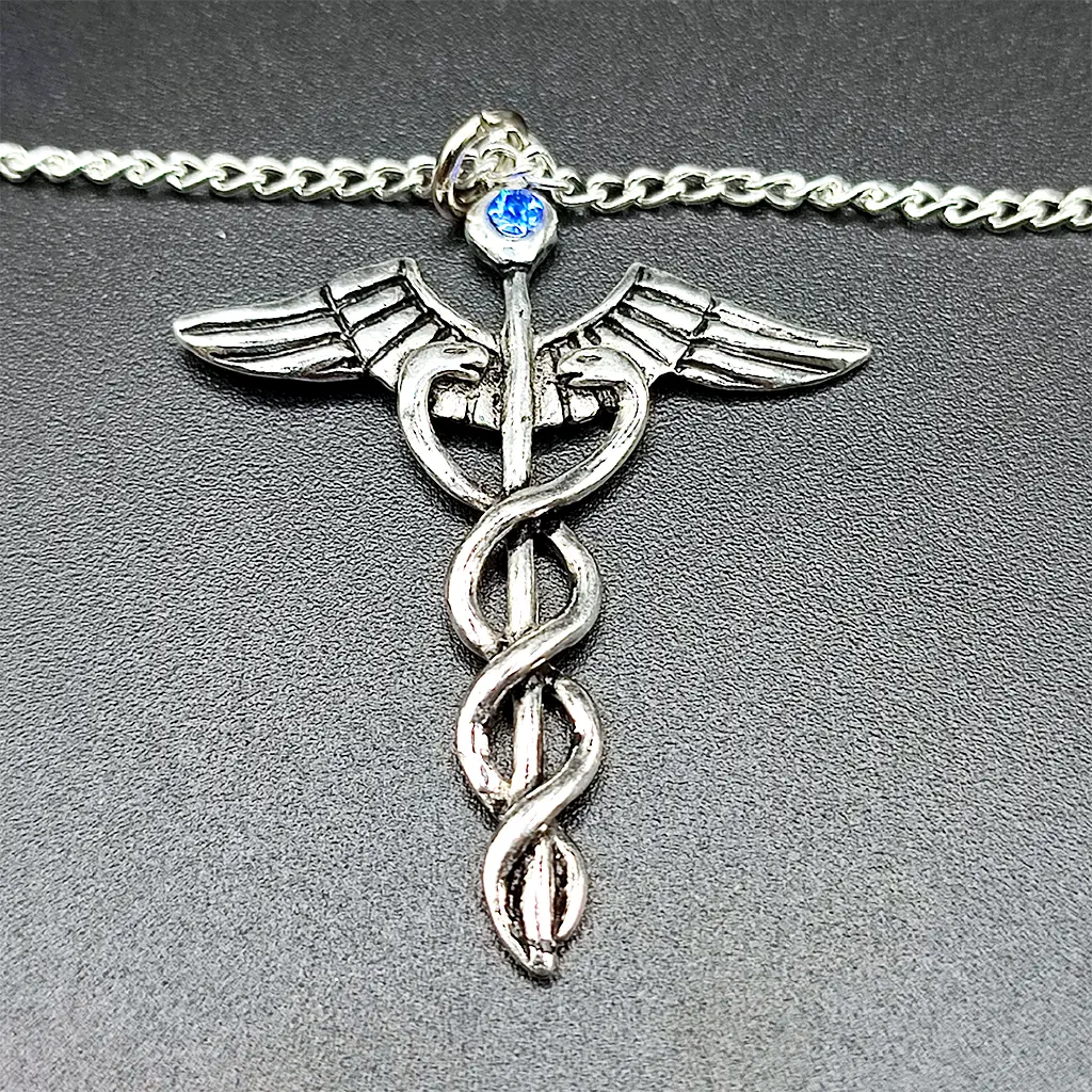 colgante caduceo simbolo sanacion energia equilibrio