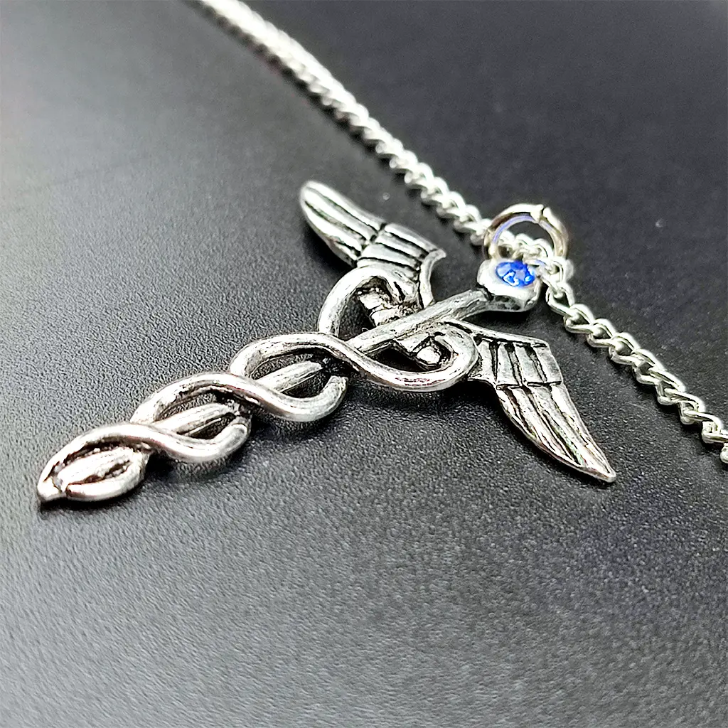 colgante caduceo simbolo sanacion energia equilibrio