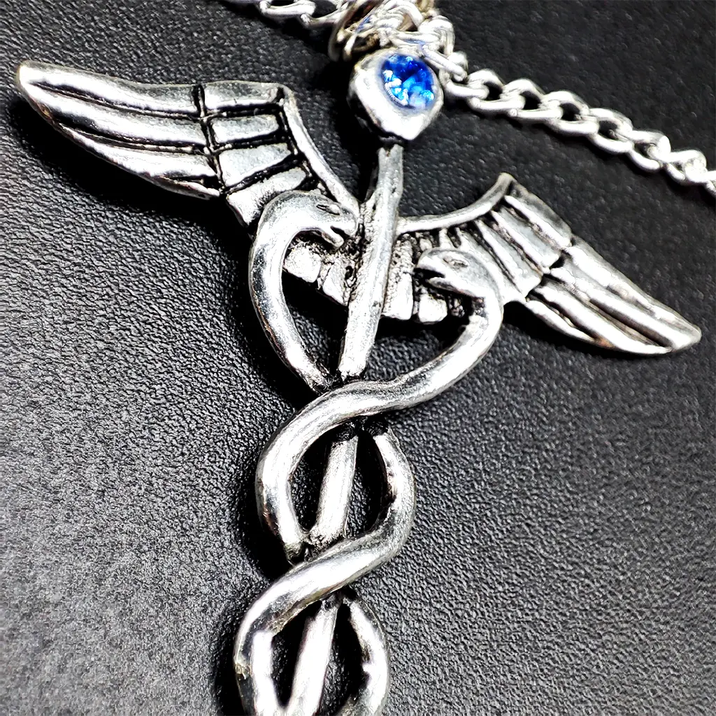 colgante caduceo simbolo sanacion energia equilibrio