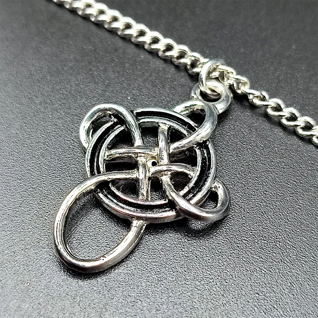 colgante nudo celta cruz proteccion union equilibrio