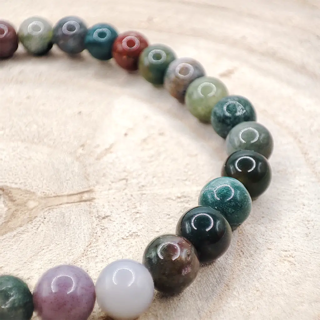 Pulsera Ágata India 6 mm Pulsera de Ágata India de 6 mm con tonos verdes y terrosos naturales.