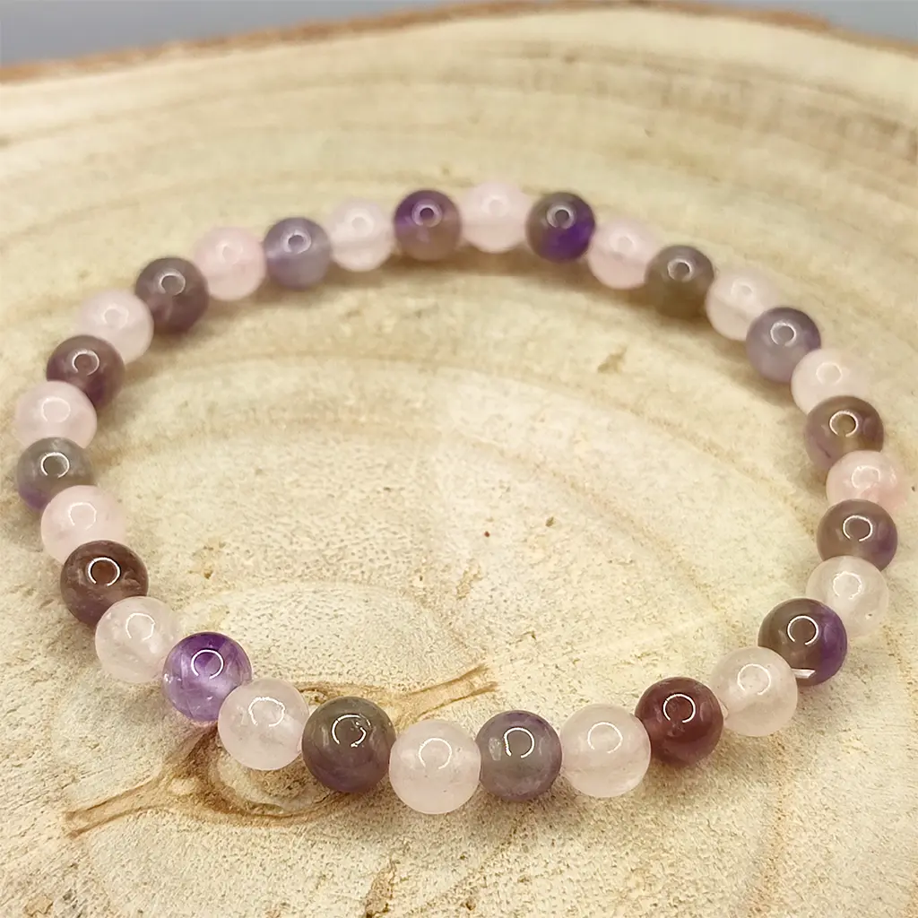 Pulsera Alma Gemela elaborada con cuentas de Cuarzo Rosa y Amatista natural de 6 mm.