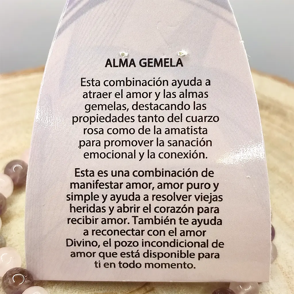 Pulsera Alma Gemela de Cuarzo Rosa y Amatista 6 mm Pulsera Alma Gemela elaborada con cuentas de Cuarzo Rosa y Amatista natural de 6 mm.