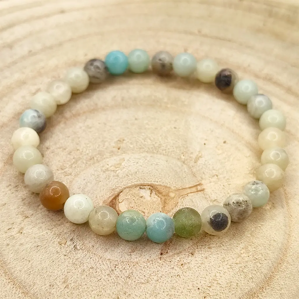 Pulsera de Amazonita natural de 6 mm en tonos verde agua y crema.