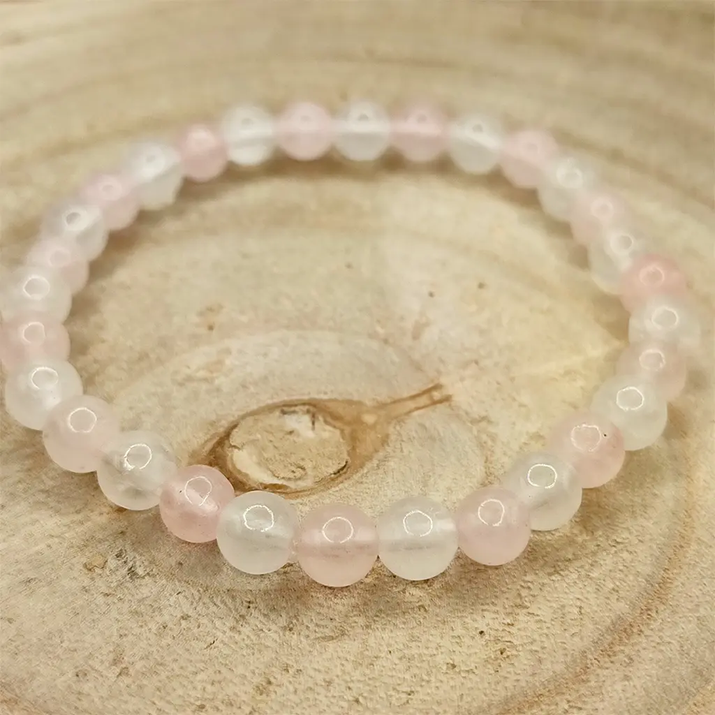 Pulsera Amor Propio y Pureza elaborada con Cuarzo Rosa y Cuarzo Blanco natural de 6 mm.