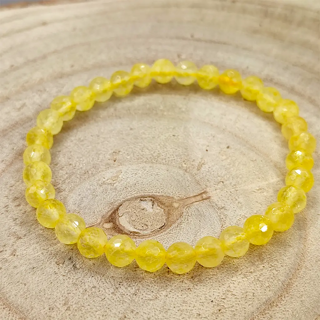 Pulsera facetada de Citrino de 6 mm con cuentas amarillas brillantes y acabado luminoso.