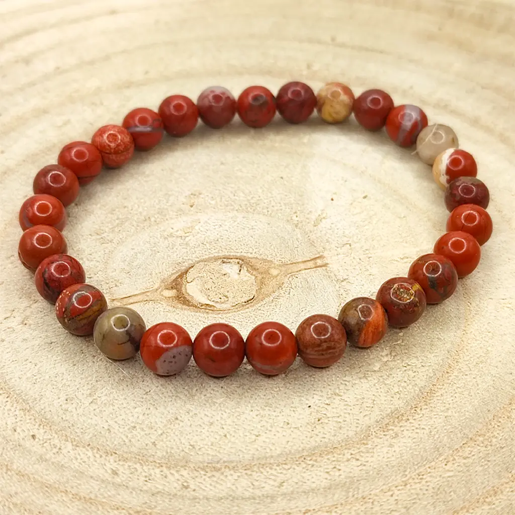 Pulsera de Jaspe Rojo natural de 6 mm con tonos rojizos y terrosos.