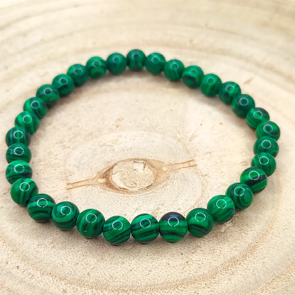 Pulsera de Malaquita natural de 6 mm con bandas verdes características.
