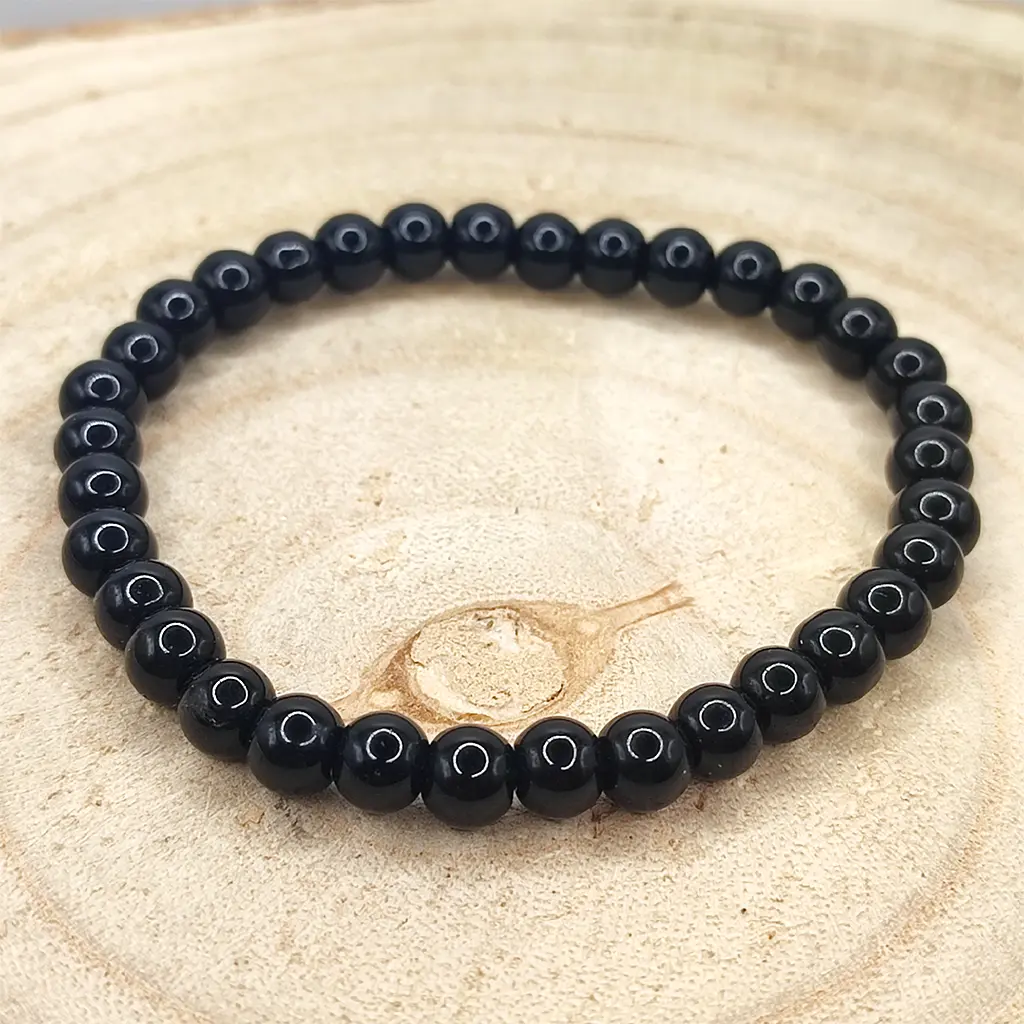 Pulsera de Ónix Negro natural de 6 mm con acabado brillante.
