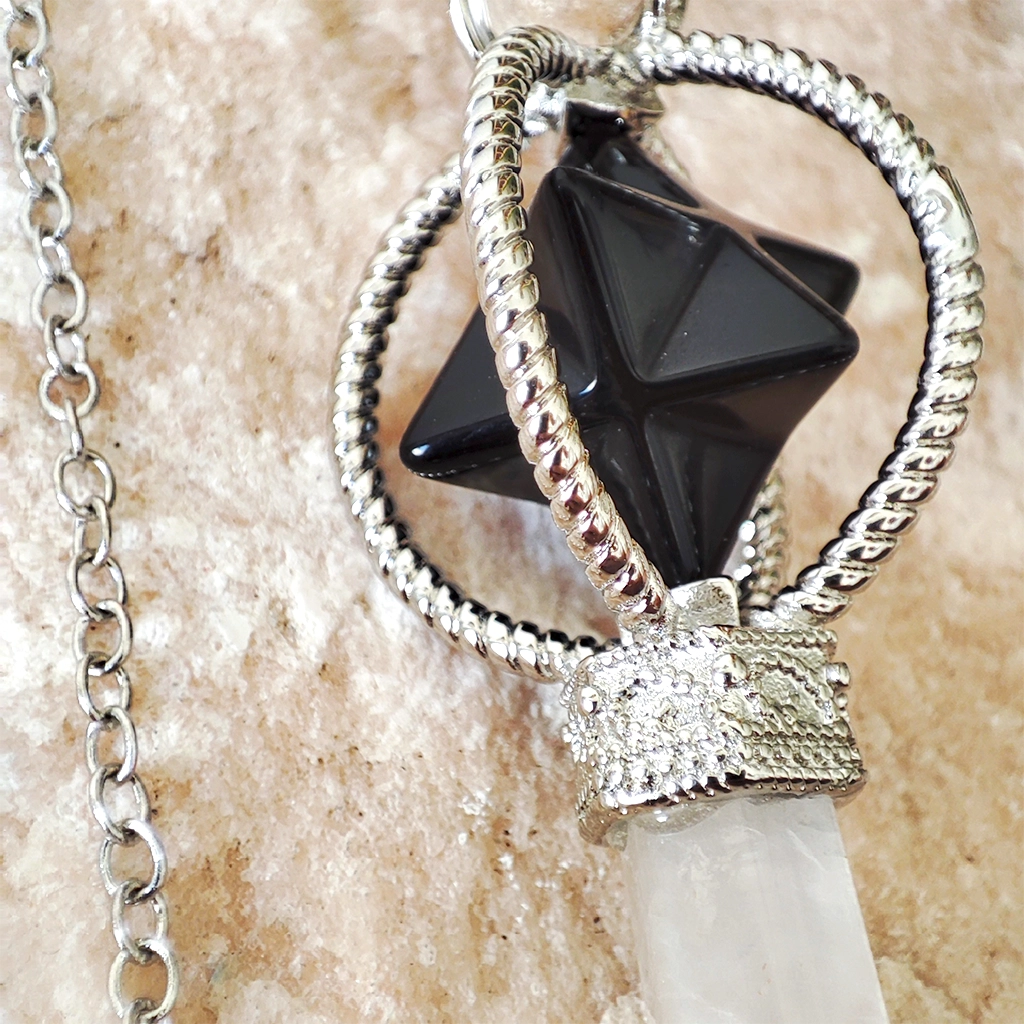 Péndulo Merkaba de Obsidiana y Cuarzo Péndulo Merkaba de obsidiana con punta de cuarzo blanco